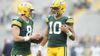 Sean-Clifford-8-and-Jordan-Love-10-of-the-Green-Bay-Packers-talk-before-a-preseason-game-against-the-Seattle-Seahawks-aspect-ratio-16-9